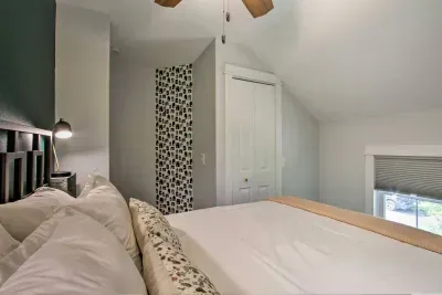 Queen Bedroom: Enjoy stylish decor and plush bedding for the perfect night’s rest on the second floor!