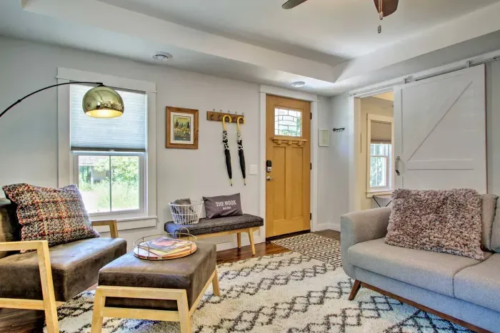 Living Room: Bright and inviting space, perfect for relaxing with scenic views and stylish decor!