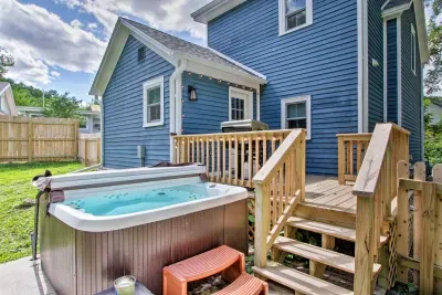 Outdoor Oasis: Unwind in the hot tub while enjoying the scenic views of Galena's charm!