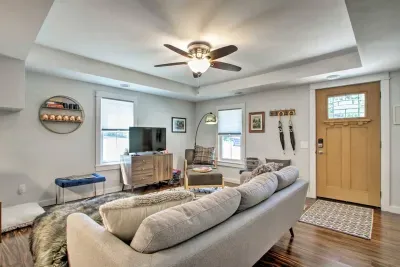 Living Room: Stylish setting with a plush sofa, bright windows, and unique decor to unwind!