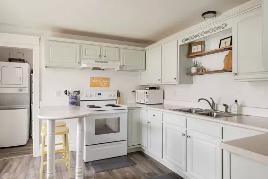 Charming Kitchen: Whip up delicious meals in this sunlit, well-equipped kitchen!