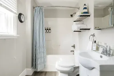Bathroom Bliss: Bright, airy space with modern amenities and stylish decor for your refresh.
