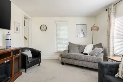 Living Room: Bright and airy space with plush seating, perfect for relaxation and gathering!