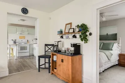 Charming Interior: Bright open space with coffee corner, coastal vibes, and inviting decor await!