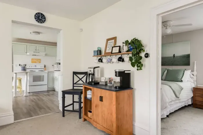 Charming Interior: Bright open space with coffee corner, coastal vibes, and inviting decor await!