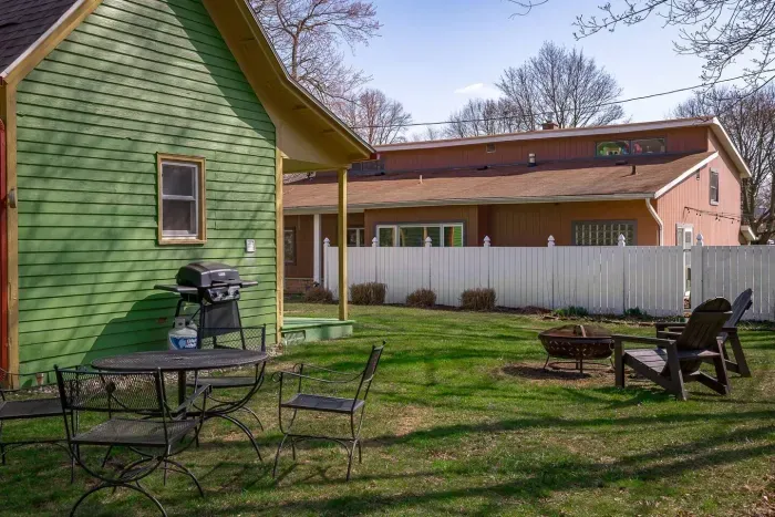 Outdoor Space: Enjoy fun barbecues and s'mores by the fire pit in your spacious backyard!