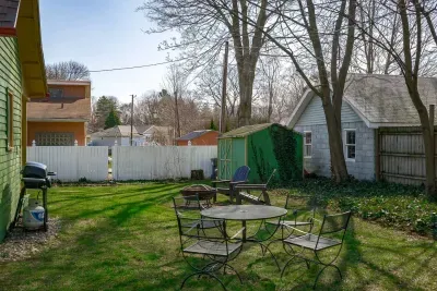 Backyard Oasis: Enjoy sun-soaked afternoons in this spacious yard with fire pit and grill!