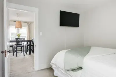 Bedroom Retreat: Enjoy restful nights with a plush bed, chic decor, and a cozy vibe!