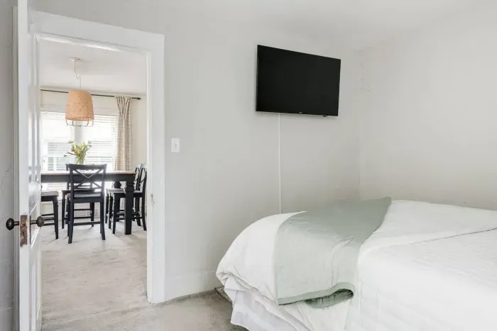 Bedroom Retreat: Enjoy restful nights with a plush bed, chic decor, and a cozy vibe!