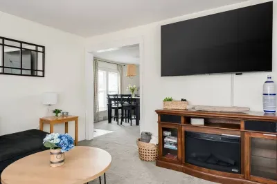 Living Room: Bright space featuring a TV, relaxing seating, and stylish decor for fun hangouts!