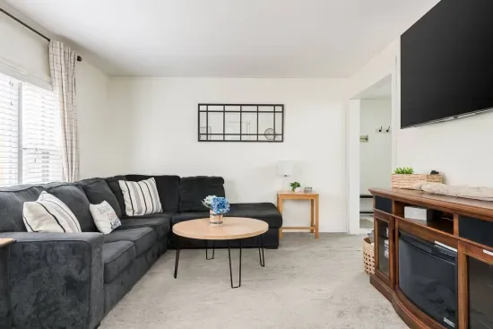 Living Room: Stylish space with plush seating and natural light for unforgettable gatherings!