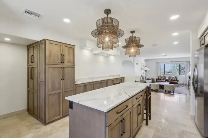 Chef's Kitchen: Stunning space with modern finishes and unique pendant lighting for culinary adventures!