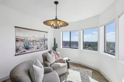 Sunny Sitting Room: Enjoy breathtaking desert views in this artfully designed retreat!