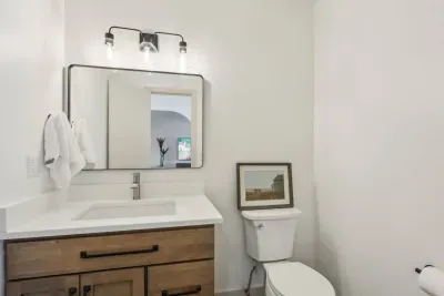 Stylish Bathroom: Modern design with sleek finishes and bright lighting for a refreshing retreat!