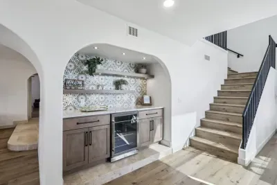 Kitchenette: Stylish, dining-adjacent space with modern finishes and inviting decor for aperitif adventures!