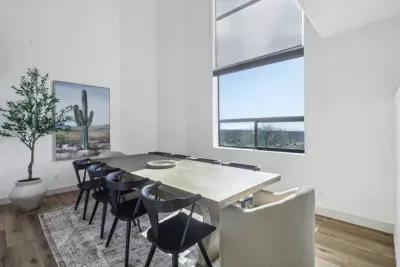 Dining Room: Gather around the spacious table with stunning views to elevate your mealtime experience!