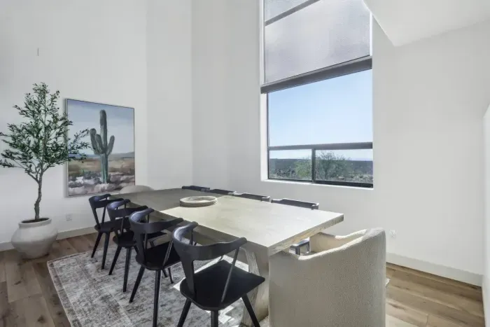 Dining Room: Gather around the spacious table with stunning views to elevate your mealtime experience!