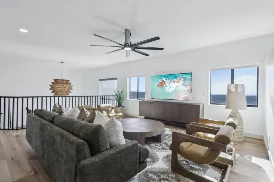 Upper Level Family Room Retreat: Bright, inviting space with modern decor and stunning mountain vistas!