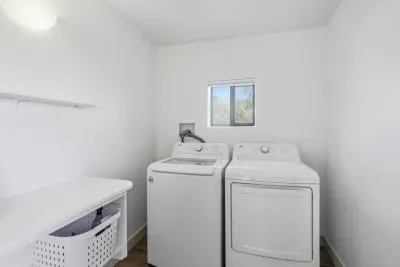 Laundry Room: Convenient machines with natural light—perfect for keeping things fresh!