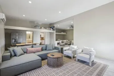 Spacious Living Room: Enjoy entertaining with abundant seating and modern decor in this stylish, separate  guest-house retreat!