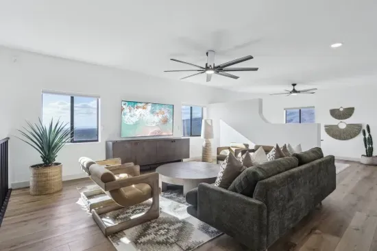 Living Room: Stylish space with mountain views, perfect for relaxing and entertaining!
