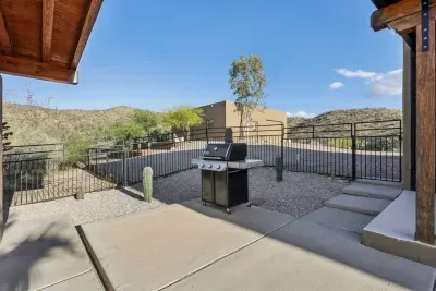 Outdoor Patio: Sizzle dinner under the stars with scenic mountain views and a BBQ grill!