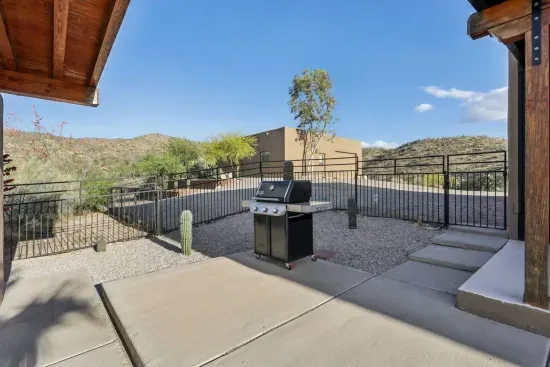 Outdoor Patio: Sizzle dinner under the stars with scenic mountain views and a BBQ grill!