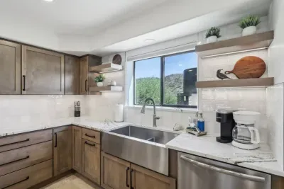 Modern Kitchen: Bright and airy space with sleek finishes, perfect for culinary adventures!