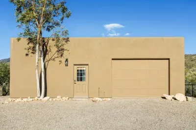 Separate Guest House Exterior View: Experience desert charm with stunning mountain backdrops and a welcoming entrance!