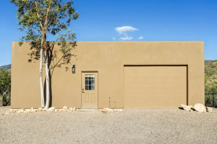 Separate Guest House Exterior View: Experience desert charm with stunning mountain backdrops and a welcoming entrance!