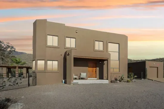 Exterior: Explore modern architecture with stunning mountain views and a welcoming entrance!
