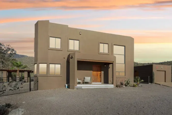 Exterior: Explore modern architecture with stunning mountain views and a welcoming entrance!