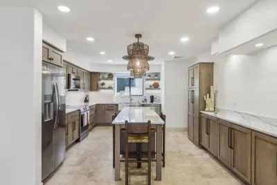 Gourmet Kitchen: Elegant space with modern appliances and stylish pendant lighting—cook in style!