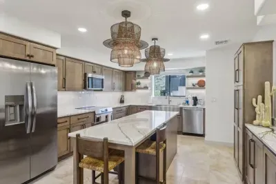 Gourmet Kitchen: Elegant space with modern appliances and stylish pendant lighting—cook in style!