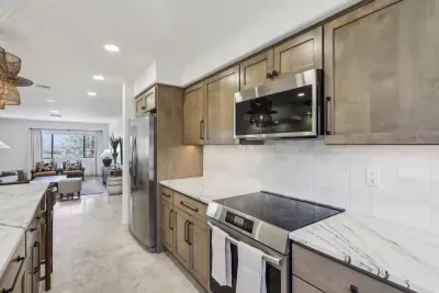 Kitchen: Bright and spacious, featuring high-end appliances and stylish countertops for culinary adventures!