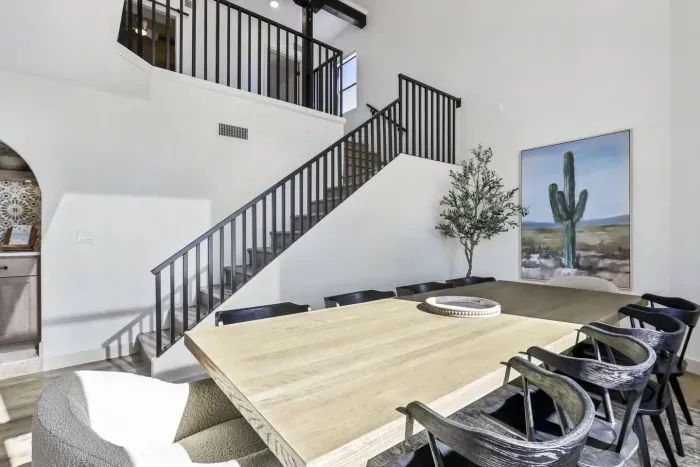 Dining Room: Enjoy vibrant meals at this spacious table, surrounded by modern decor and natural light!
