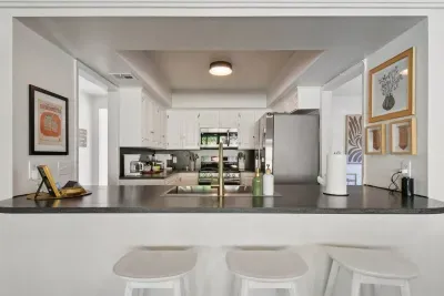 Kitchen: Modern design meets functionality—enjoy cooking with friends in style!