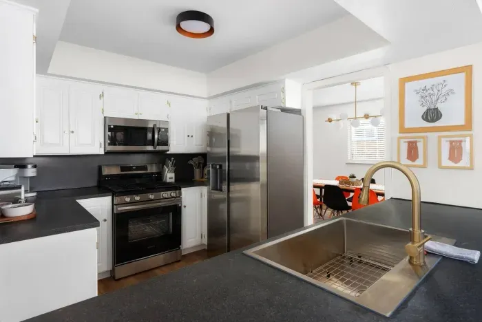 Gourmet Kitchen: Whip up culinary delights in this sleek, modern kitchen with elegant finishes!