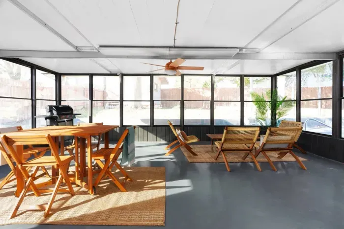 Sunroom Retreat: Brighten your mornings with sunlight and fresh air in this inviting space!