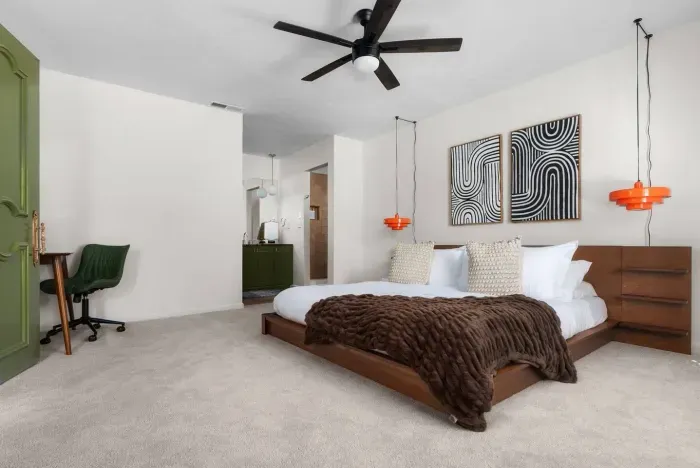 Sleek, King Suite Retreat: Modern decor, vibrant accents, and comfort await your Austin getaway!