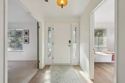 Entryway: Bright and welcoming entrance leading to stylish rooms full of Austin charm!