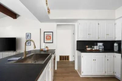 Kitchen Delight: Sleek design meets function in this inviting space—perfect for culinary adventures! Coffee Nook included!