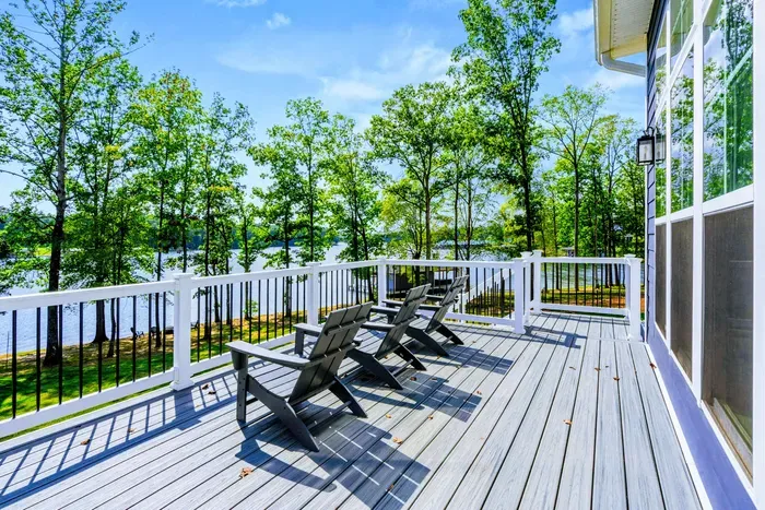 Upper Deck - Relax in the Adirondack chairs on the upper deck while taking in sweeping lake views through the trees.