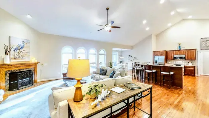 Experience luxury and comfort in this spacious lakefront home, featuring an open-concept design, vaulted ceilings, and stunning natural light.