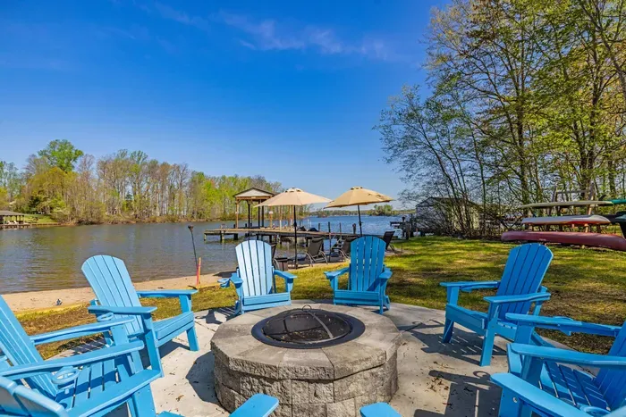The Beach Escape: Lounge chairs and an umbrella right on the water's edge.