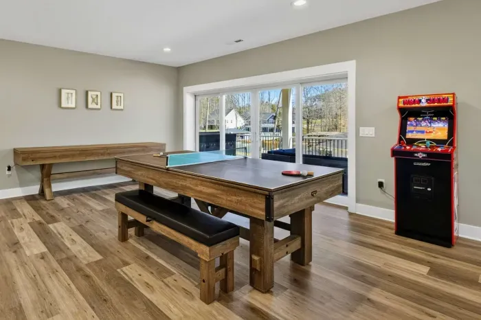 Game Room - Pool, ping pong, and a classic arcade cabinet set the tone for downstairs fun.