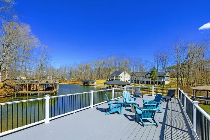 Upper Dock Deck - Blue skies and calm water from the top level of the dock, with seating for the whole group.