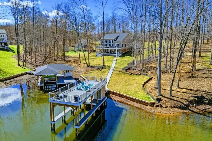 Lakeside Living - Where the backyard meets the water and every evening ends around the fire pit.