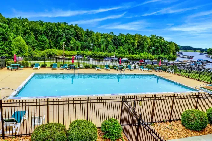 Dive into relaxation at the community pool, complete with scenic lake views and ample lounge seating—perfect for unwinding after a day of adventure!