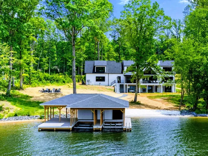 Backyard - A private shoreline surrounded by mature trees and calm water, perfect for slow mornings and peaceful evenings by the lake.